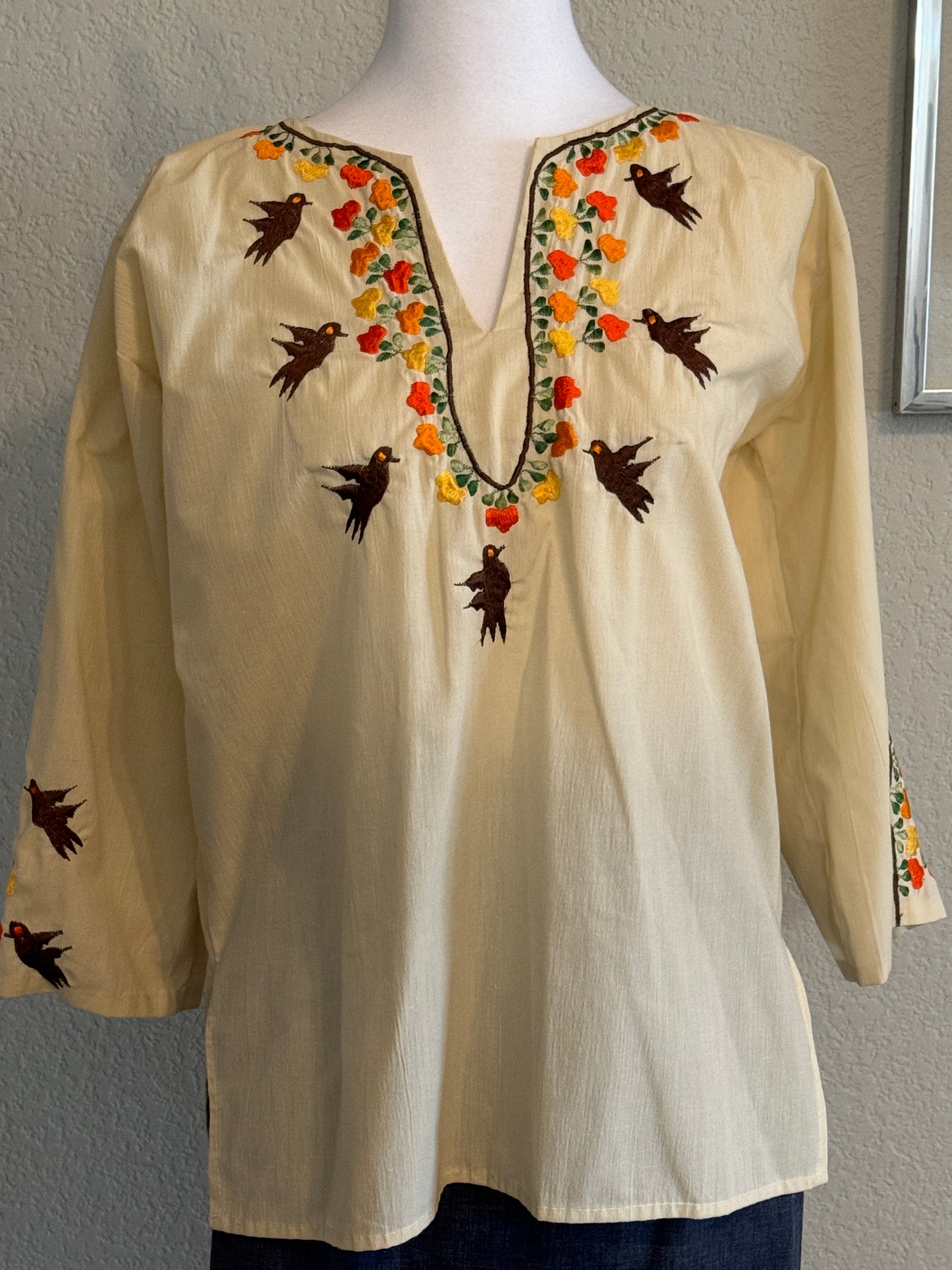 Men Lor  Creme Three Quater Length Blouse With Embroidered Birds Accent