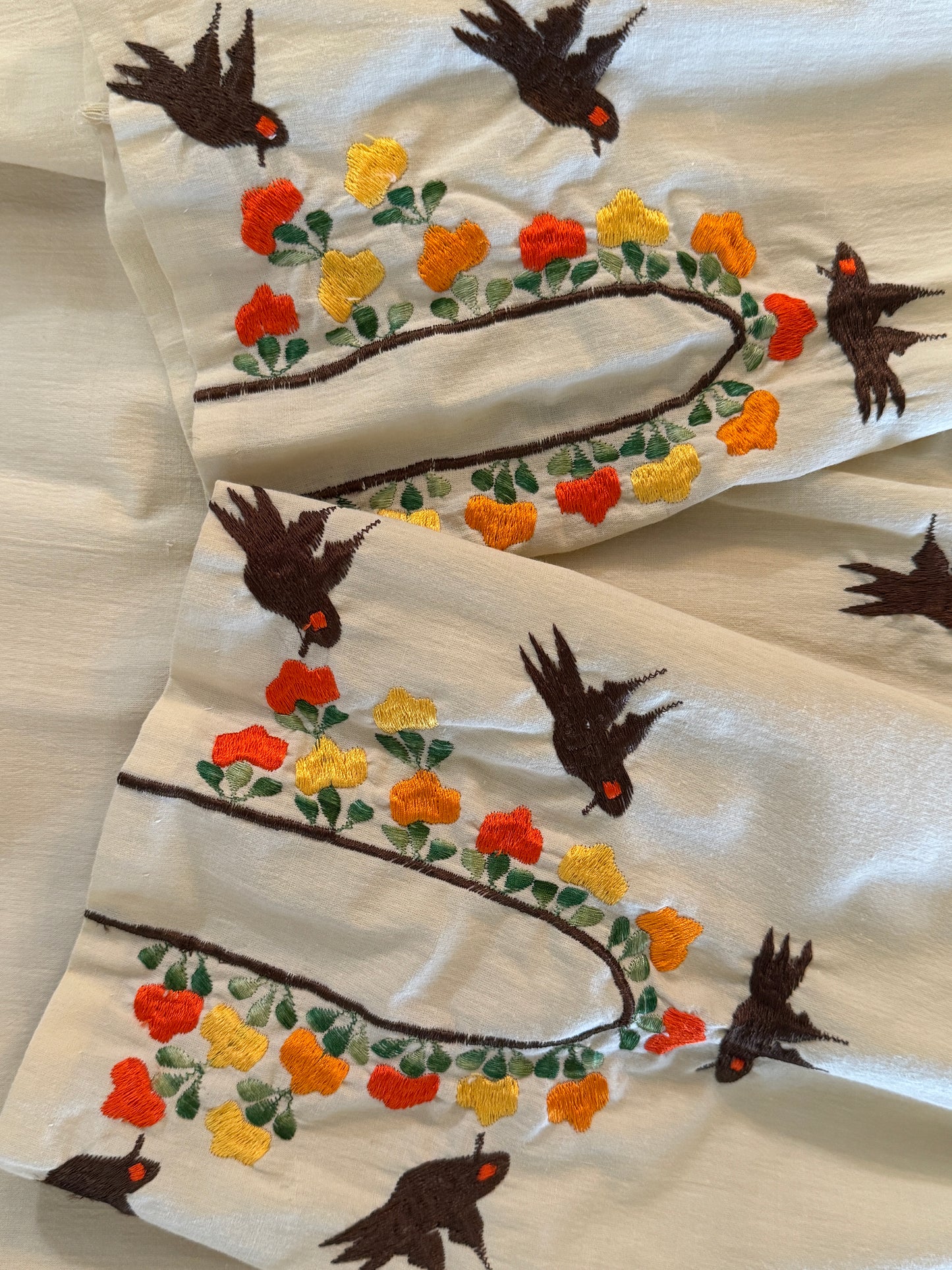 Men Lor  Creme Three Quater Length Blouse With Embroidered Birds Accent