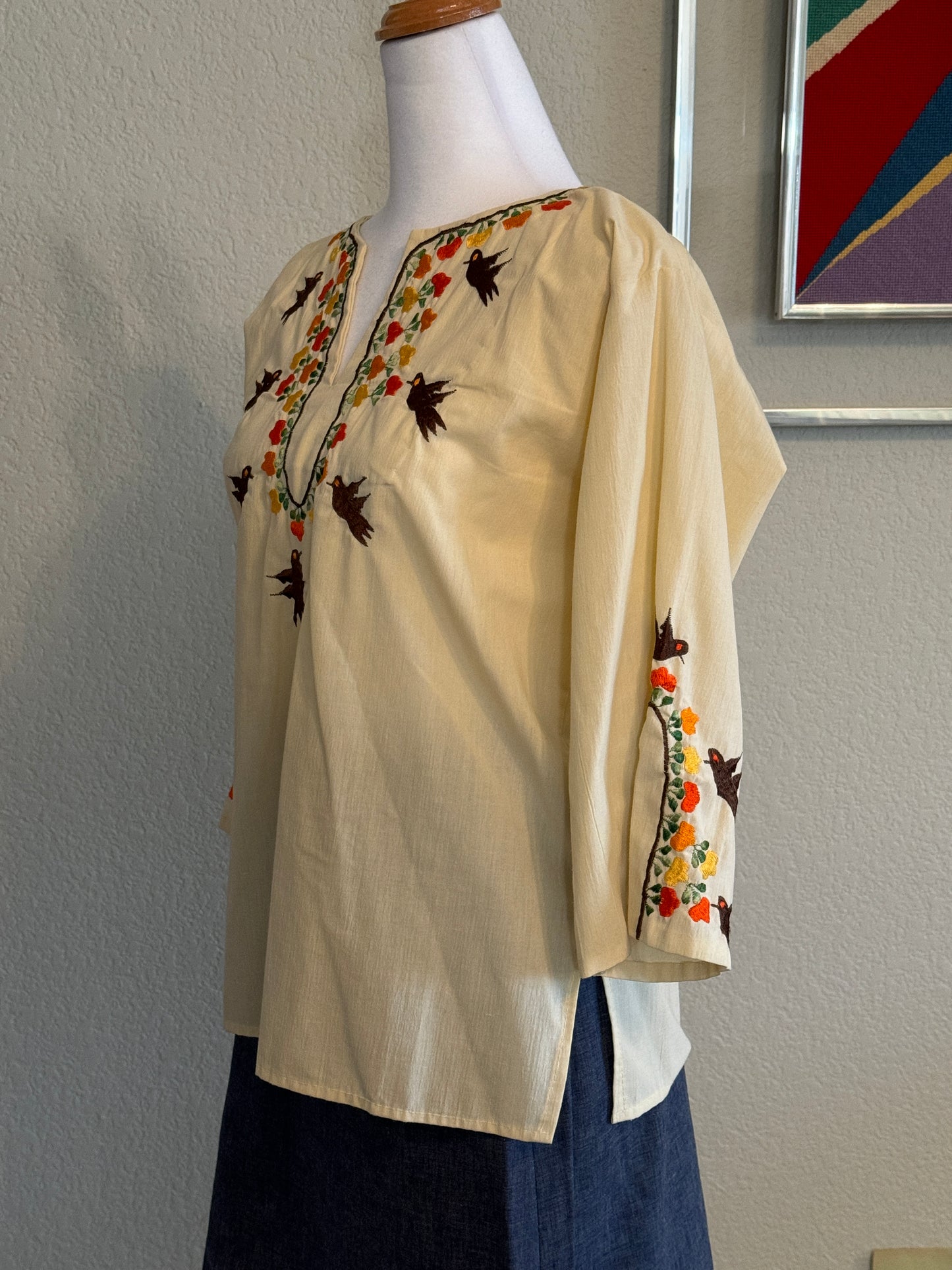 Men Lor  Creme Three Quater Length Blouse With Embroidered Birds Accent