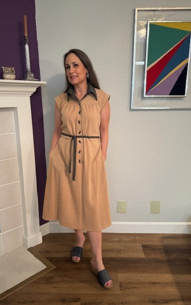 A lined Crème / Medium Tan Colored Dress with Brown Collar and Belt